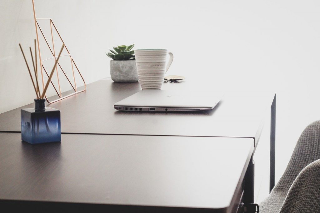 A simple and clean work from home desk with accessories