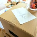 Packing list on tops of boxes.